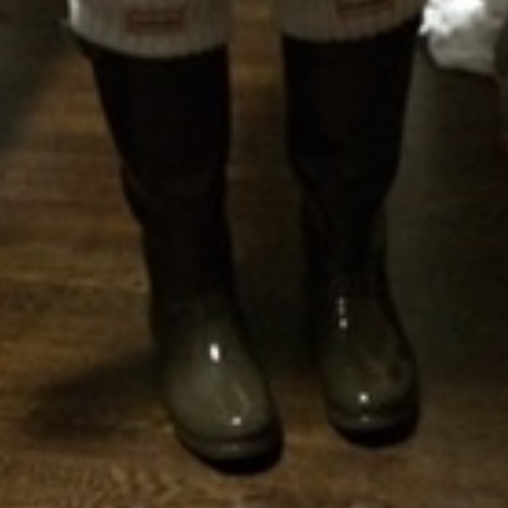 Woman’s tall hunter rain boots